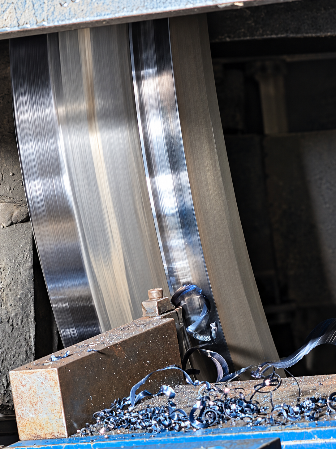 Close-up of locomotive wheel tyre turning and metal cutting